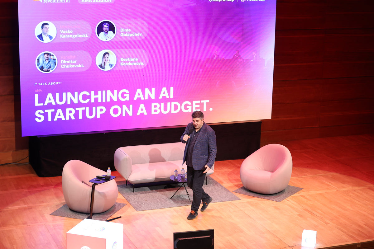 Early-stage founders collaborating around a working session table.
